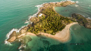 Aerial view of Santo Aleixo island surrounded by turquoise sea