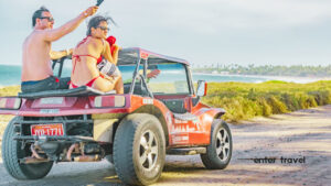 Tourists enjoying a buggy ride in Porto de Galinhas